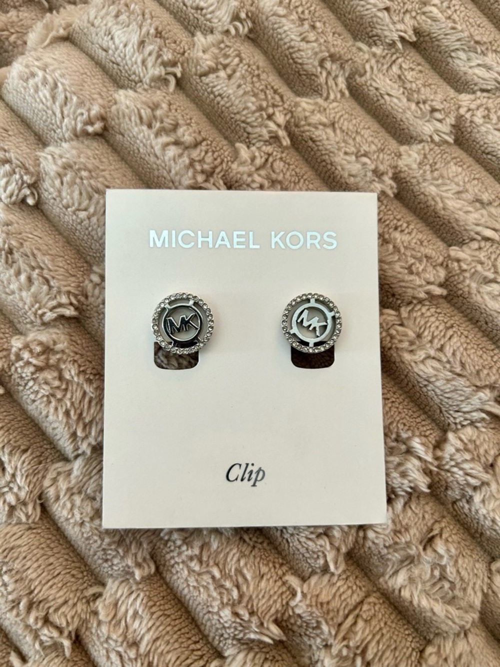Michael Kors Silver Tone MK Logo Clip-On Earrings with Crystal Halo